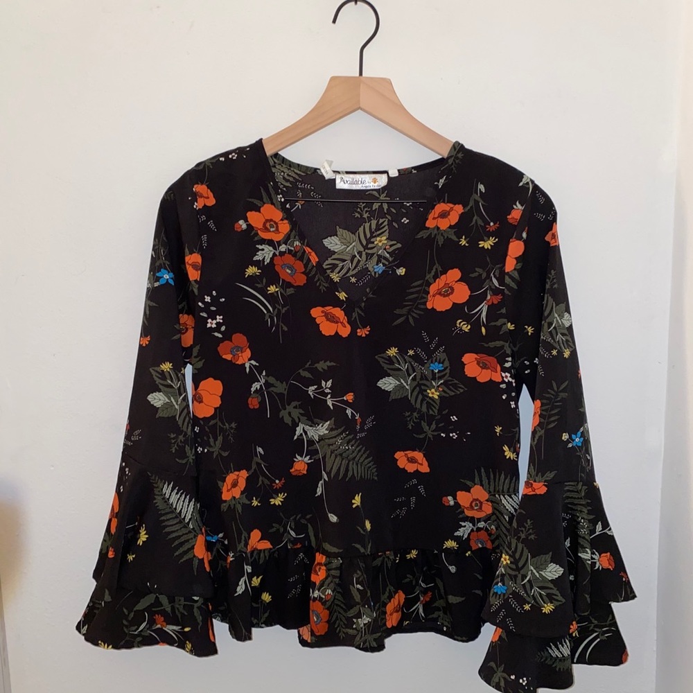 patterned blouse with bell sleeves